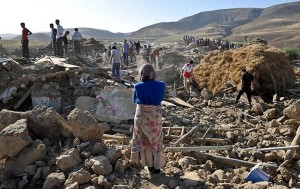 Rescue teams search for victims in the earthquake-stricken village of Varzaqan near Ahar, in the East Azerbaijan province