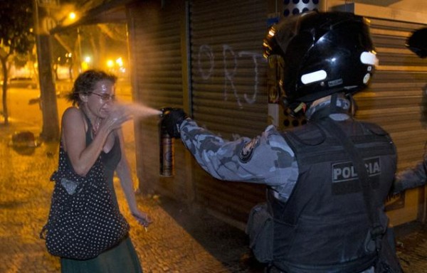 Police Use Pepper Spray on Protester.
