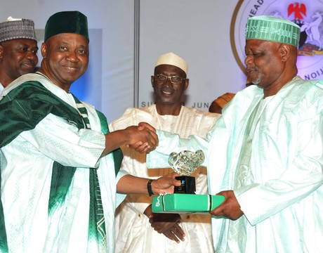 VICE PRESIDENT NAMADI SAMBO (L), PRESENTING A PUBLIC SERVICE CARER AWARD TO THE RETIRED HEAD OF CIVIL SERVICE OF THE FEDERATION, ALHAJI ISA BELLO  SALI (R), DURING 2013  CIVIL SERVICE DINNER AND AWARD NIGHT IN ABUJA ON SUNDAY  NIGHT.