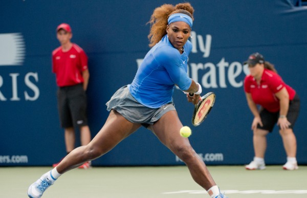 Serena Williams Returns a Shot During Her Match Against Fransesca Shciavoni.