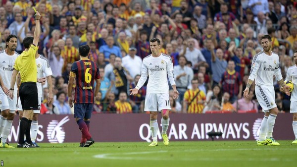 Image AFP: Gareth Bale Being Showed a Yellow Card During Saturday's El Clasico. 