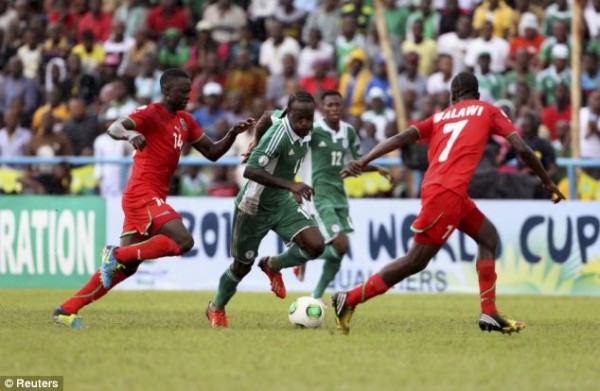 Victor Moses Dribbles Flames of Malawi Players in Calabar.