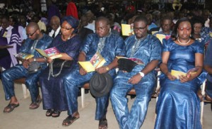 Iyayi's widow and children at the funeral service