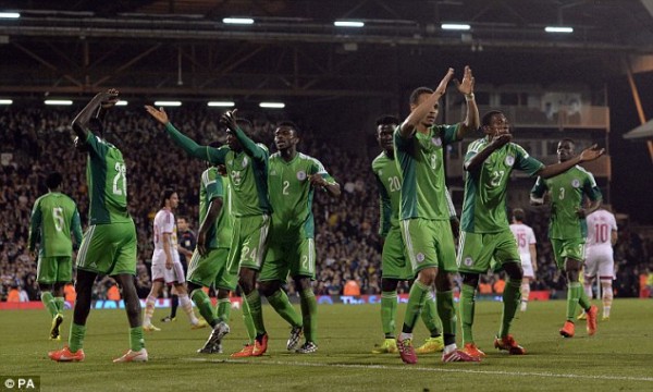 Nigerian Players Celebrates Uche Nwofor's 91st Minute Leveler.PA.