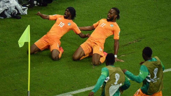 Gervinho and Drogba Celebrates Ivory Coast's Winning-Goal Against Japan.