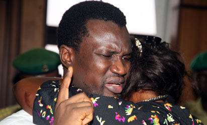 THE WIFE OF THE CONVICT, TESSY EBIWARE WITH HER HUSBAND EDMUND EBIWARE AFTER HE WAS SENTENCED TO LIFE IMPRISONMENT AT FEDERAL HIGH COURT ABUJA ON FRIDAY. 
