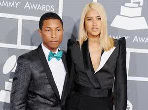 Pharrell Williams with a guest