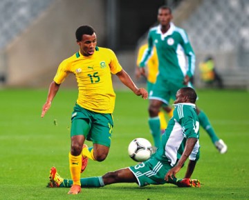 South-Africa’s-Asive-Langwe-left-evades-Tolulope-Aluko-of-Nigeria’s-Flying-Eagles-during-an-invitational-tournament-at-the-Cape-Town-Stadium-...-on-Tuesday-360x290