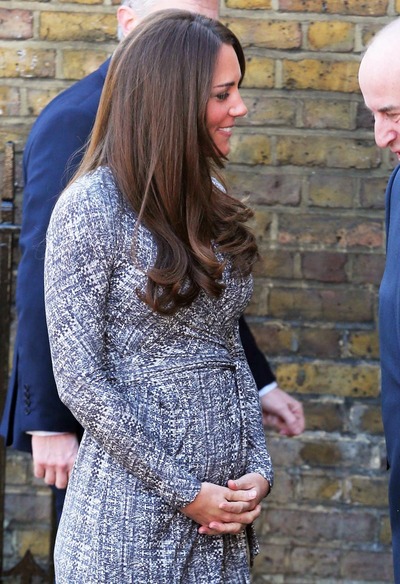The Duchess of Cambridge aka Kate Middleton displays her baby bump as she is seen arriving at Hope House in South London