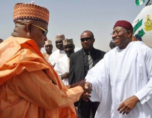 PRESIDENT GOODLUCK JONATHAN (R) BEING RECEIVED BY GOV.  KASHIM SHETTIMA OF BORNO IN MAIDUGURI DURING HIS VISIT TO BORNO  ON THURSDAY 