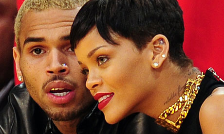 Chris Brown and Rihanna attending an NBA  game in Los Angeles