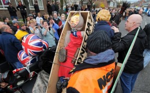 An effigy of former Margaret Thatcher is placed in a 'coffin' as people gather to celebrate her in Goldthorpe (AFP)
