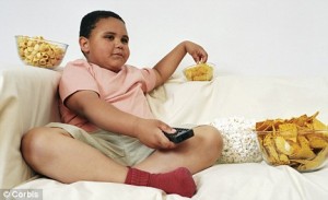 Overweight-Child-Eating-Snacks