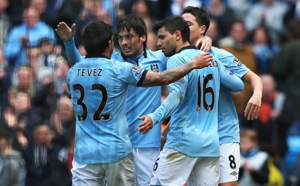 Sergio Aguero Celebrates With Teammates After Scoring Against West Ham.