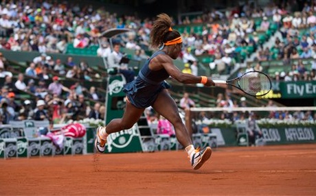 Serena Williams Fends Off Roberta Vinci's Challenges.