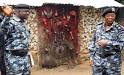 file: policemen at a suspected ritualist's shrine