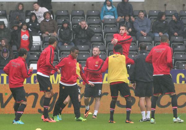 Rooney and Teammates Warm Up Before Opening Day Match Against Swansea.