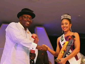 MBGN 2013 IN WARM HANDSHAKE WITH GOV. DICKSON OF BAYELSA STATE