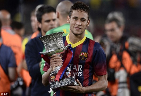 Neymar Lifts First Trophy With Barcelona.