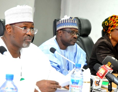 INEC NATIONAL CHAIRMAN, PROF. ATTAHIRU JEGA (L), ADDRESSING MEMBERS OF POLITICAL PARTIES DURING INEC 3RD QUARTERLY CONSULTATIVE MEETING IN ABUJA ON  TUESDAY (24/9/13). WITH HIM ARE THE INEC NATIONAL COMMISSIONERS DR CHRIS IYIMOGA (M) AND DAME GLADYS NWAFOR
