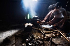 A-woman-preparing-food-in-a-kitchen-in-Guangxi-Province-China-2247055