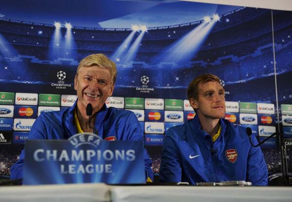 Arsene Wenger and Per Mertesacker at the Press Conference for Tonight's Group F Opener.