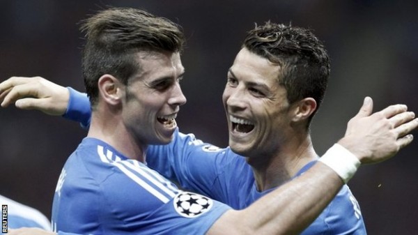 Gareth Bale celebrates With Teammate Ronaldo After the Portuguese Scored From His Free-Kick.