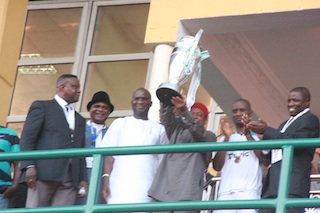 Governor Orji, Flanked By Babatunde Raji Fashola of Lagos State, Displays the Federation Cup. 