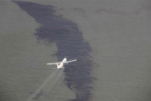 Shell's  Hercules C-130 delivers airborne dispersants to the area of the suspected spill.