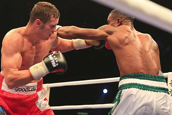 Image: Peter Gercke for SES Boxing. Isaac Ekpo's Jab Misses Opponent.