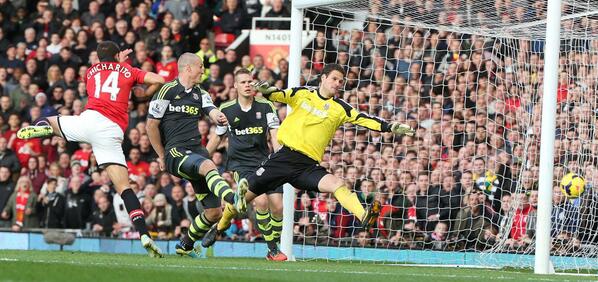 Getty Image: Chicharito Scores a Superb Header in the 80th Minute to Seal Victory for United Against Stokes. 