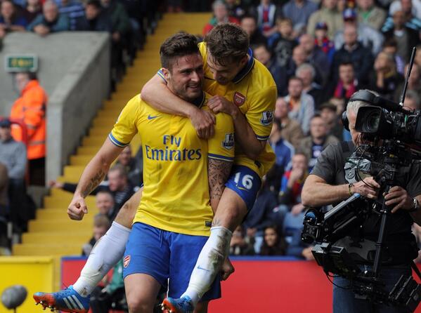 Olivier Giroud Celebrates With Welshman Aaron Ramsey at Selhaust Park on Saturday.