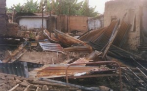 file: house destroyed during the invasion of Odi