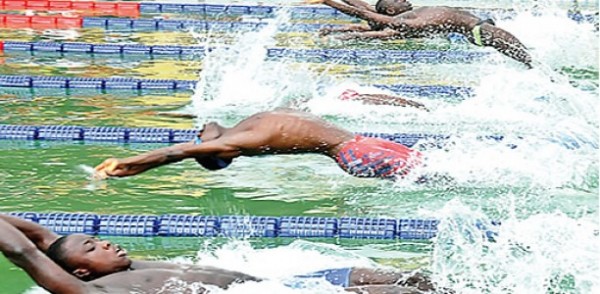 Swimmers at the Teslim Balogun Stadium Swimming Pool Facility.   