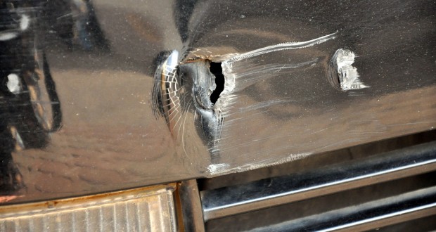 A BULLET HOLE IN ONE OF AVIATION MINISTER'S CARS, FOLLOWING AN ALLEGED ATTACK BY UNKNOWN GUNMEN ON MINISTER'S HILL ROAD IN ABUJA ON FRIDAY NIGHT. (NAN)