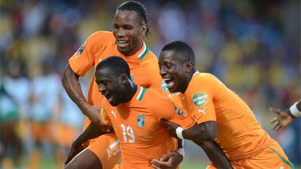 Drogba Celebrates with Teammates after Grabbing the 23 Ticket for Next Summer's World Cup.   