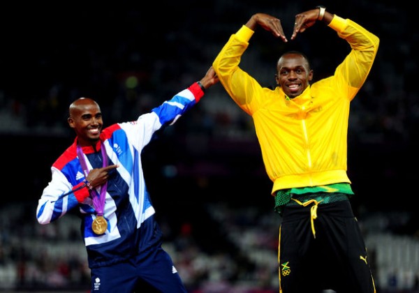 Usain Bolt and Mo Farah Trade Poses at the London Olympics.