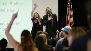 British comedians and co-founders of the Sunday Assembly, Sanderson Jones, right, and Pippa Evans sing a song at the Sunday Assembly in Los Angeles photo:AP