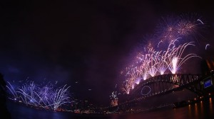 New Year Fireworks light up the sky from The Sydney Harbour Bridge at midnight during New Years Eve celebrations 