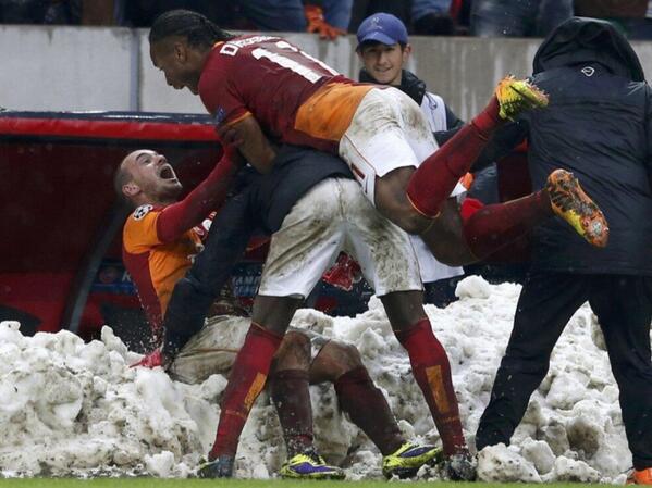 Let it Snow!!! Drogba Celebrates After Sneijder's Late Winner.  