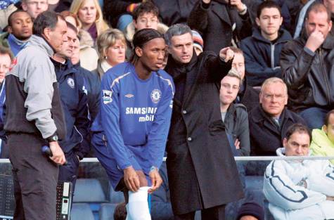 Jose Mourinho Instructs Didier Drogba Before a Chelsea Substitution During His First Spell at the Bridge.