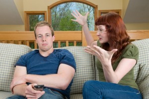 woman-nagging-husband-on-couch
