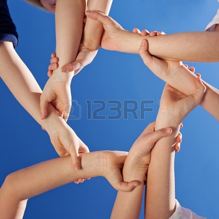 21223787-friendship--a-conceptual-image-of-the-hands-of-young-children-gripping-each-other-at-the-wrist-to-fo