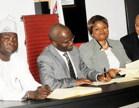 GOV. FASHOLA SIGNS 2014 BUDGET INTO LAW IN LAGOS PIC. 12.  FROM LEFT: DEPUTY SPEAKER, LAGOS HOUSE OF ASSEMBLY, MR KOLAWOLE TAIWO; GOV. BABATUNDE FASHOLA OF LAGOS; DEPUTY GOVERNOR, MRS ADEJOKE ORELOPE-ADEFULIRE AND COMMISSIONER FOR BUDGET AND PLANNING, MR BEN AKABUEZE, AT THE SIGNING OF 2014 BUDGET INTO LAW  IN LAGOS ON MONDAY(13/1/14). 