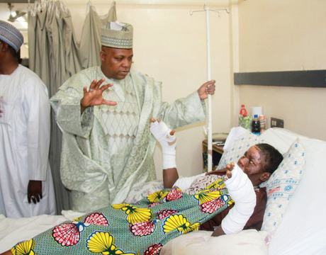 GOV. KASHIM SHETTIMA OF BORNO, SPEAKING WITH OF ONE THE YET TO BEDISCHARGED VICTIMS OF THE JANUARY 14, MAIDUGURI BOMB BLAST AT THE UNIVERSITY OF MAIDUGURI TEACHING HOSPITAL WHEN THE GOVERNOR UNDERTOOK A SECOND VISIT ON WEDNESDAY (22/1/14) TO REASSESS THE STATE OF THE VICTIMS.