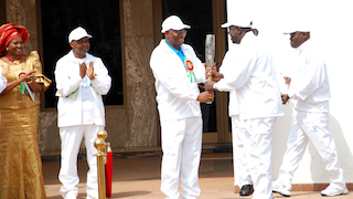 President Jonathan Receives the Queen's Baton from the Sports Minister. Photo: OP via PM News.