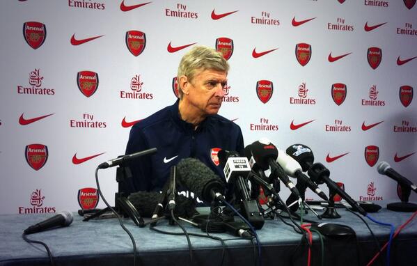 Wenger Wants Arsenal to Keep Momentum and Not be Distracted by Other Team's Progress.
