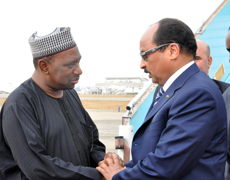 MINISTER OF STATE FOR WORKS, AMB. BASHIR YUGUDA (L), WELCOMING PRESIDENT MOHAMED ABDEL AZIZ OF MAURUTANIA ON HIS ARRIVAL AT THE NNAMDI AZIKIWE INTERNATIONAL AIRPORT FOR NIGERIA CENTENARY CELEBRATION IN ABUJA ON WEDNESDAY (26/2/14).