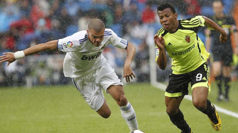 Ikechukwu Uche Takes on Pepe of Real Madrid.