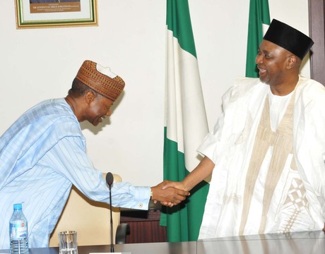 VICE-PRESIDENT NAMADI SAMBO (R), IN A HANDSHAKE WITH THE CHAIRMAN, TANSMMISSION COMPANTY OF NIGERIA (TCN), MR IBRAHIM  WAZIRI, AT A MEETING AT THE PRESIDENTIAL VILLA IN ABUJA.